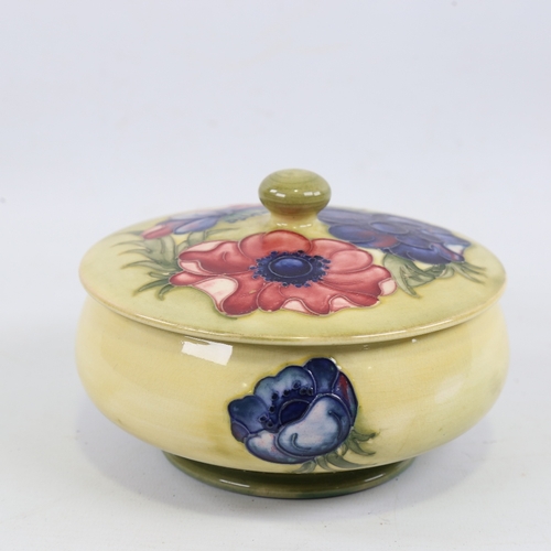 258 - MOORCROFT POTTERY - poppy design bowl and cover, diameter 14cm