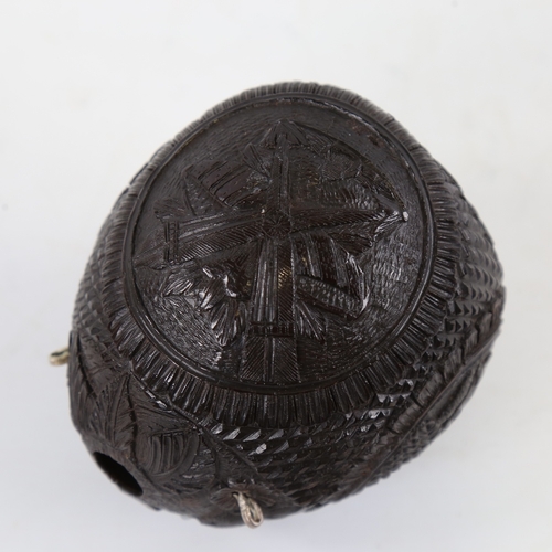 108 - 19th century Napoleonic coconut flask, relief carved allover with military insignia, length 10.5cm