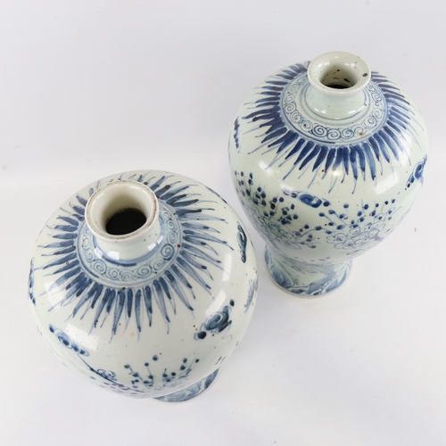 121 - A pair of Chinese blue and white porcelain narrow-neck jars, hand painted floral decoration, height ... 