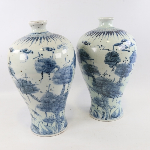 121 - A pair of Chinese blue and white porcelain narrow-neck jars, hand painted floral decoration, height ... 