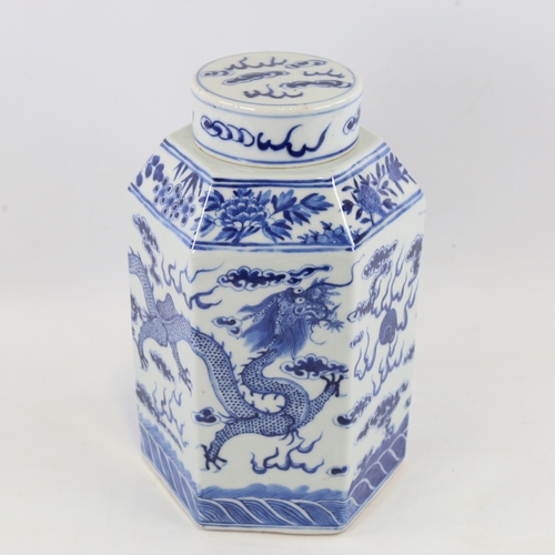 122 - A Chinese blue and white porcelain jar and cover of hexagonal form, hand painted dragon and pearl de... 