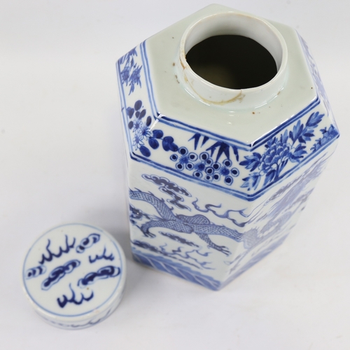 122 - A Chinese blue and white porcelain jar and cover of hexagonal form, hand painted dragon and pearl de... 