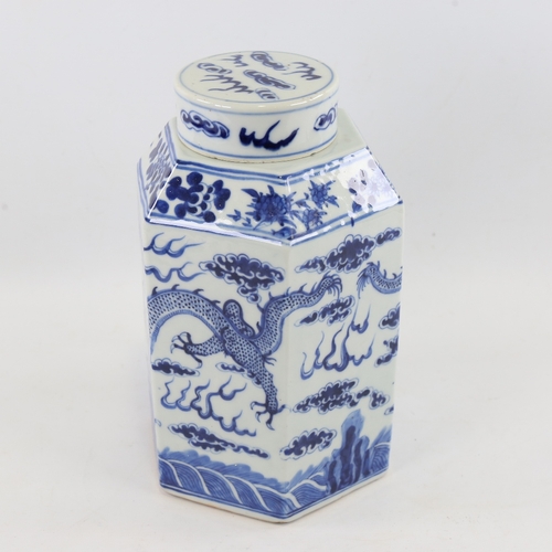 122 - A Chinese blue and white porcelain jar and cover of hexagonal form, hand painted dragon and pearl de... 