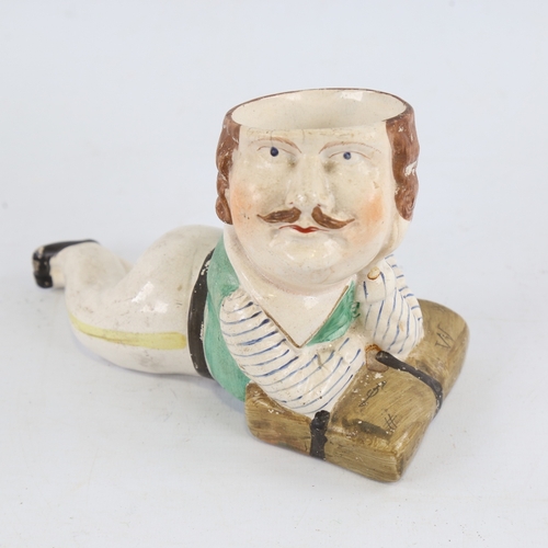 132 - A 19th century Staffordshire Pottery pot in the form of Captain Webb, the first man to swim the Engl... 