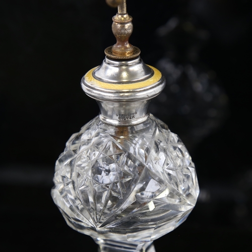 140 - 2 cut-glass silver and enamel-topped atomiser perfume bottles, largest overall height 17cm