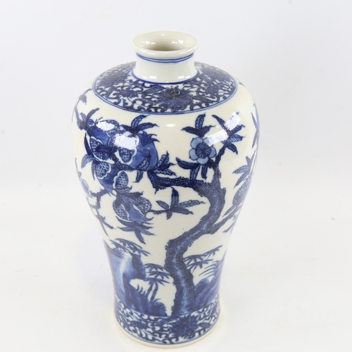 143 - A Chinese blue and white porcelain Mei Ping porcelain vase, hand painted fruit trees and bats, 4 cha... 