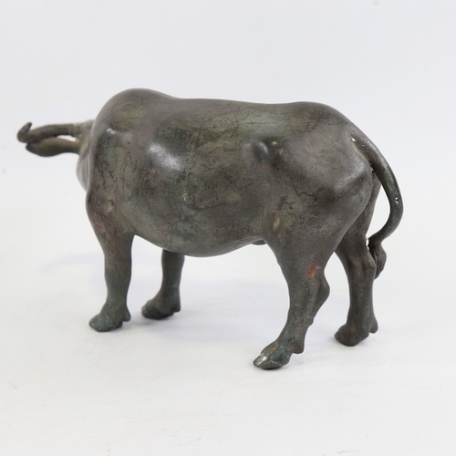 152 - A Chinese patinated bronze water buffalo, length 23cm, height 13cm