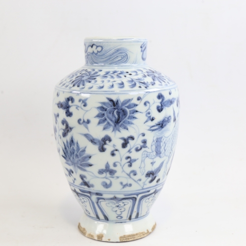 159 - A Chinese blue and white porcelain Yuan style vase, hand painted beasts, height 18cm