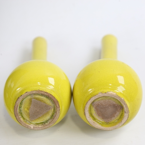 161 - A small pair of Chinese yellow glaze porcelain narrow-neck bottle vases, height 15cm