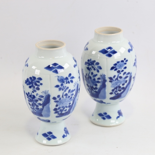 163 - A pair of Chinese blue and white porcelain globular vases, hand painted decoration with painted leaf... 