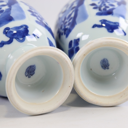 163 - A pair of Chinese blue and white porcelain globular vases, hand painted decoration with painted leaf... 