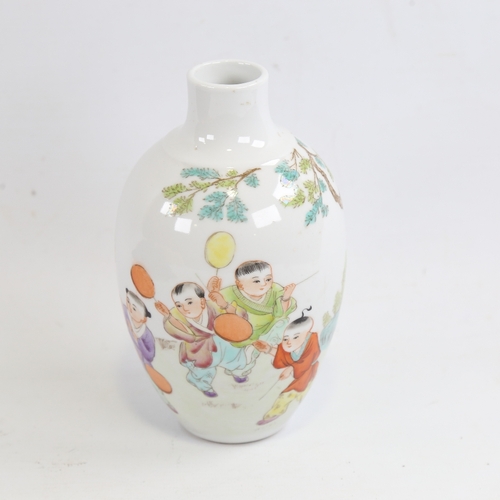 167 - A Chinese porcelain vase with painted study of children playing in gardens, 4 character mark, height... 