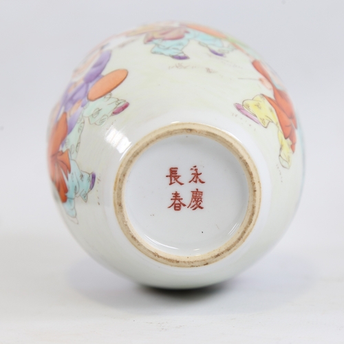 167 - A Chinese porcelain vase with painted study of children playing in gardens, 4 character mark, height... 