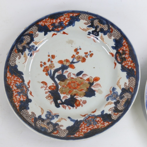 168 - 2 Chinese blue red and gilt decorated porcelain plates, diameter 23cm, A/F