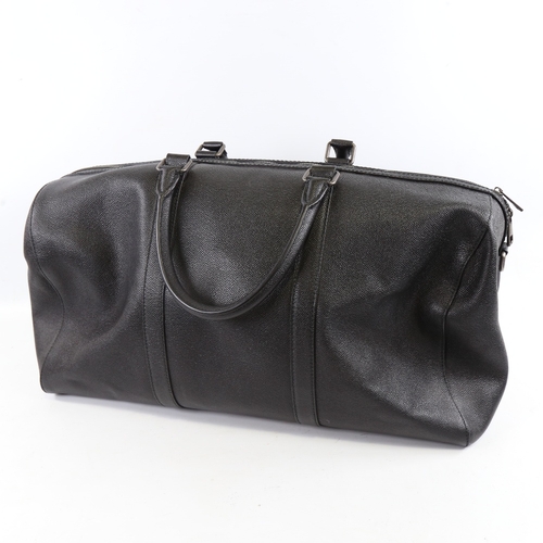 177 - DOLCE & GABBANA - a black leather holdall with shoulder strap, length approx 50cm