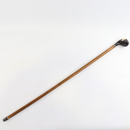 92 - A Victorian Sunday stick, combination walking cane/golf club, with ivory inlaid ebony head, length 7... 