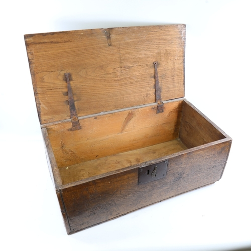 95 - An 18th century oak/elm box of plank construction, 65cm x 33cm, height 25cm