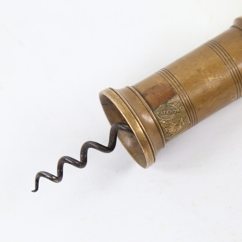 425 - A Victorian patent brass and ivory-handled corkscrew