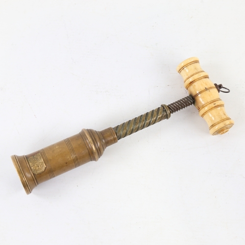 425 - A Victorian patent brass and ivory-handled corkscrew