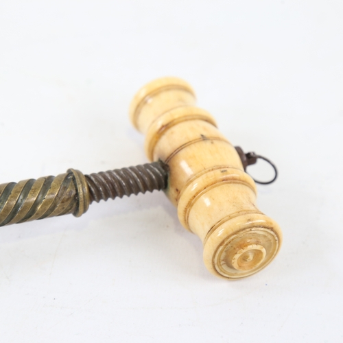 425 - A Victorian patent brass and ivory-handled corkscrew