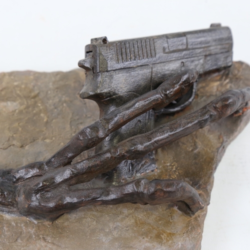 2204 - Chris Watson, Raptor claw with gun, mixed media composition/slate, 10