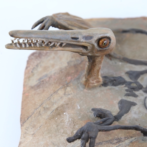 2211 - Chris Watson, Pterosaur, mixed media, stone/composition. length 14.5