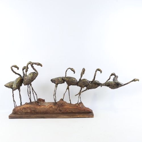 2219 - Clive Fredriksson, flock of flamingos, mixed media, wood/composition, overall length 31