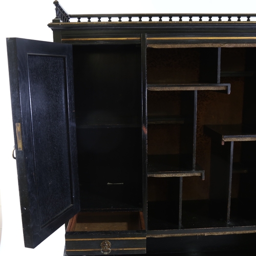 179 - A Victorian Aesthetic Movement cabinet, attributed to Collinson & Lock, gilded and ebonised wood, th... 