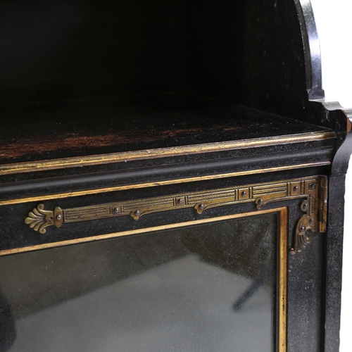 179 - A Victorian Aesthetic Movement cabinet, attributed to Collinson & Lock, gilded and ebonised wood, th... 