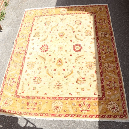 443 - A large cream ground Ziegler rug, 305cm x 242cm