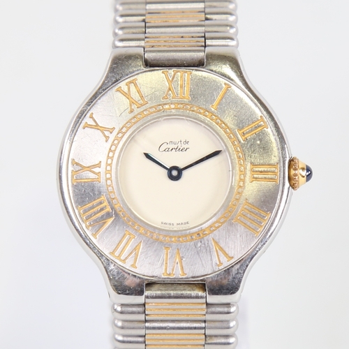 1011 - CARTIER - a lady's stainless steel Must De Cartier 21 quartz wristwatch, silvered dial with blued st... 