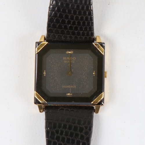 1018 - RADO - a gold plated stainless steel Florence quartz wristwatch, ref. 121.3365.2, square black dial ... 