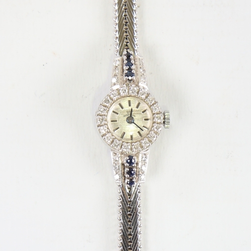 1033 - A lady's Vintage 18ct white gold diamond and sapphire mechanical cocktail wristwatch, brushed silver... 