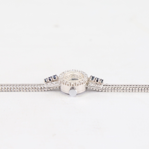 1033 - A lady's Vintage 18ct white gold diamond and sapphire mechanical cocktail wristwatch, brushed silver... 