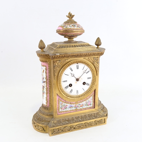 1048 - A French gilt-brass and Sevres Rose Pompador porcelain panel 8-day mantel clock, by Charles Frodsham... 