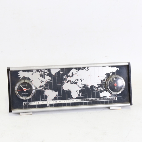 1055 - DERBY - a Vintage electronic world timer DC 2969 desk clock, with world timer tape, analogue clock a... 