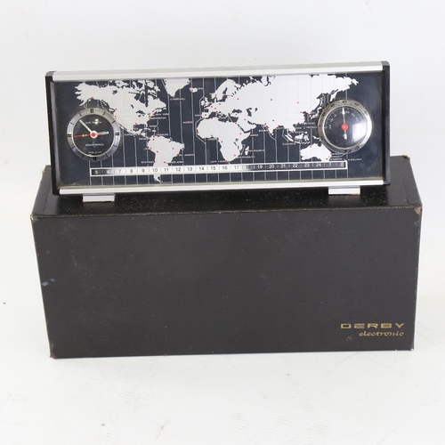 1055 - DERBY - a Vintage electronic world timer DC 2969 desk clock, with world timer tape, analogue clock a... 