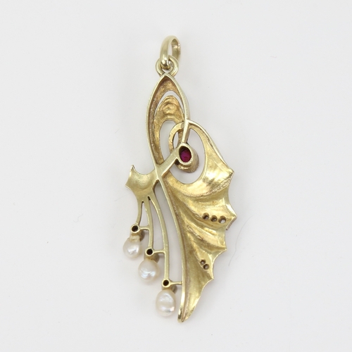 1100 - An Art Nouveau Continental 14ct gold ombre enamel ruby pearl and diamond floral pendant, openwork de... 