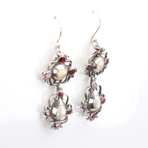 1103 - A pair of Dutch Georgian unmarked silver pearl and flat-top garnet pendant earrings, openwork scroll... 