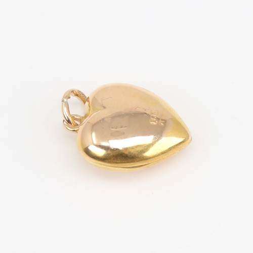 1106 - A Victorian 18ct gold diamond set heart locket pendant, set with old-cut diamond and 15ct bale, heig... 