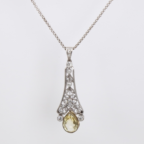 1117 - A Belle Epoque natural Ceylon yellow sapphire and diamond pendant necklace, unmarked white metal set... 