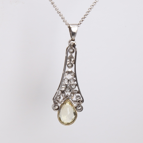 1117 - A Belle Epoque natural Ceylon yellow sapphire and diamond pendant necklace, unmarked white metal set... 