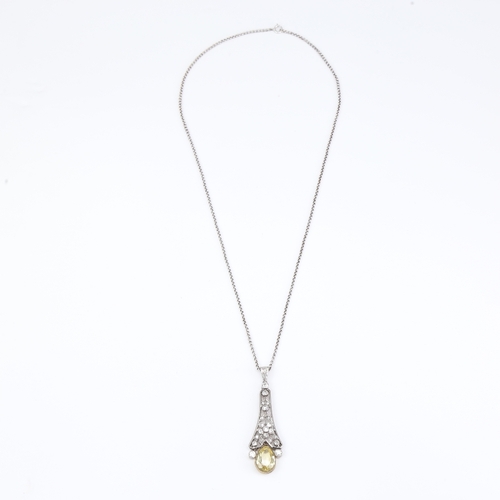 1117 - A Belle Epoque natural Ceylon yellow sapphire and diamond pendant necklace, unmarked white metal set... 