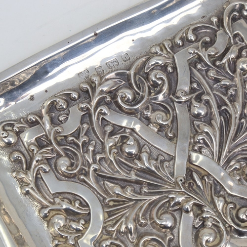 1122 - An Edwardian rectangular silver tray, allover relief embossed foliate decoration, by Williams Birmin... 