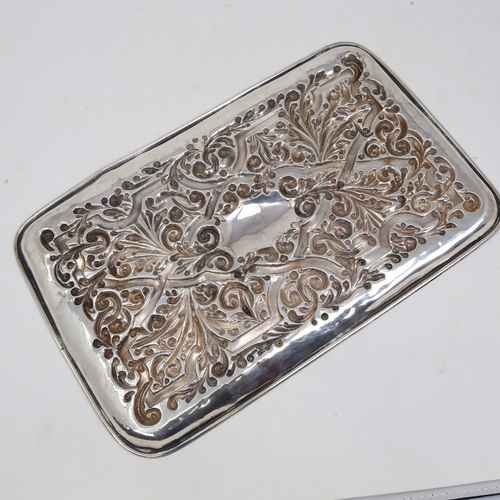 1122 - An Edwardian rectangular silver tray, allover relief embossed foliate decoration, by Williams Birmin... 