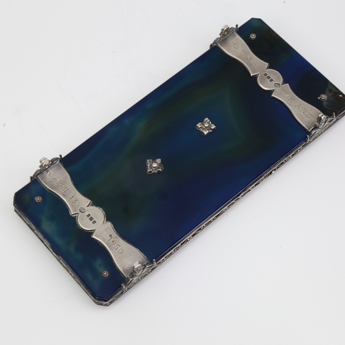 1132 - An Edwardian polished blue agate and silver inkwell desk stand, with removeable cut-glass silver-mou... 