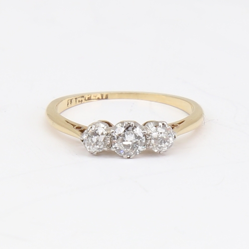 1136 - An early 20th century 18ct gold 3-stone diamond ring, set with round brilliant and old-cut diamonds,... 