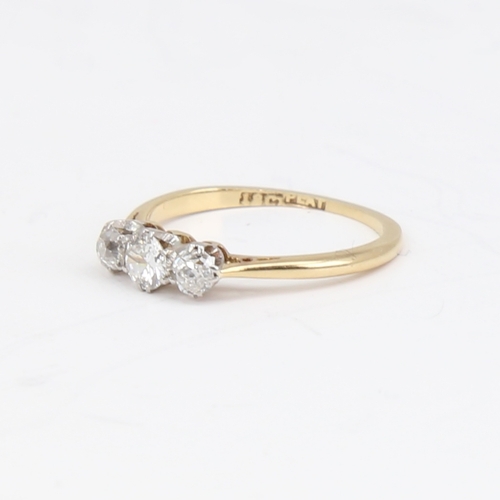 1136 - An early 20th century 18ct gold 3-stone diamond ring, set with round brilliant and old-cut diamonds,... 