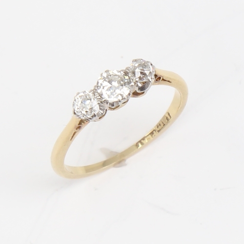 1136 - An early 20th century 18ct gold 3-stone diamond ring, set with round brilliant and old-cut diamonds,... 