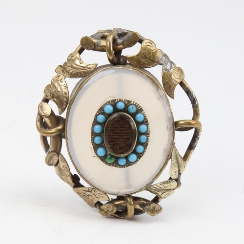 1141 - A Victorian unmarked yellow metal chalcedony turquoise and hair panel mourning brooch, floral settin... 